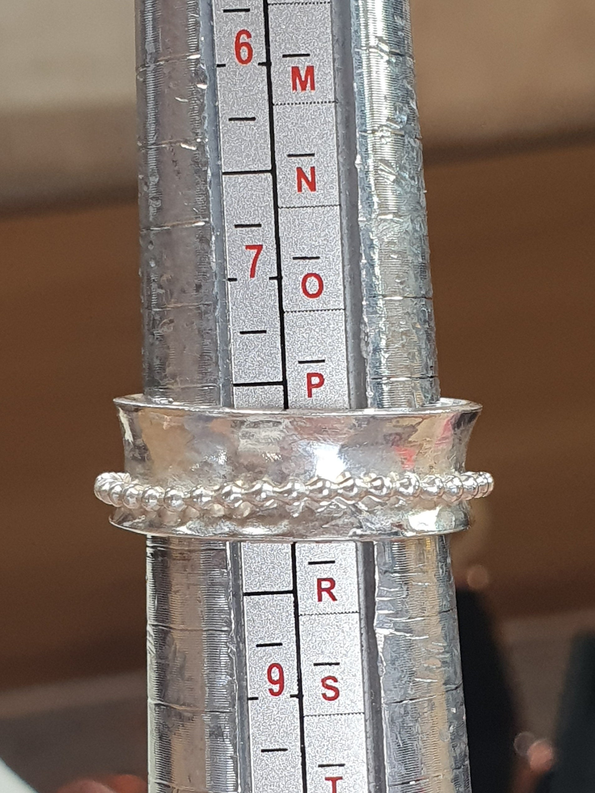 Beaded spinner ring
