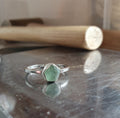 Silver ring with green sea glass focal point