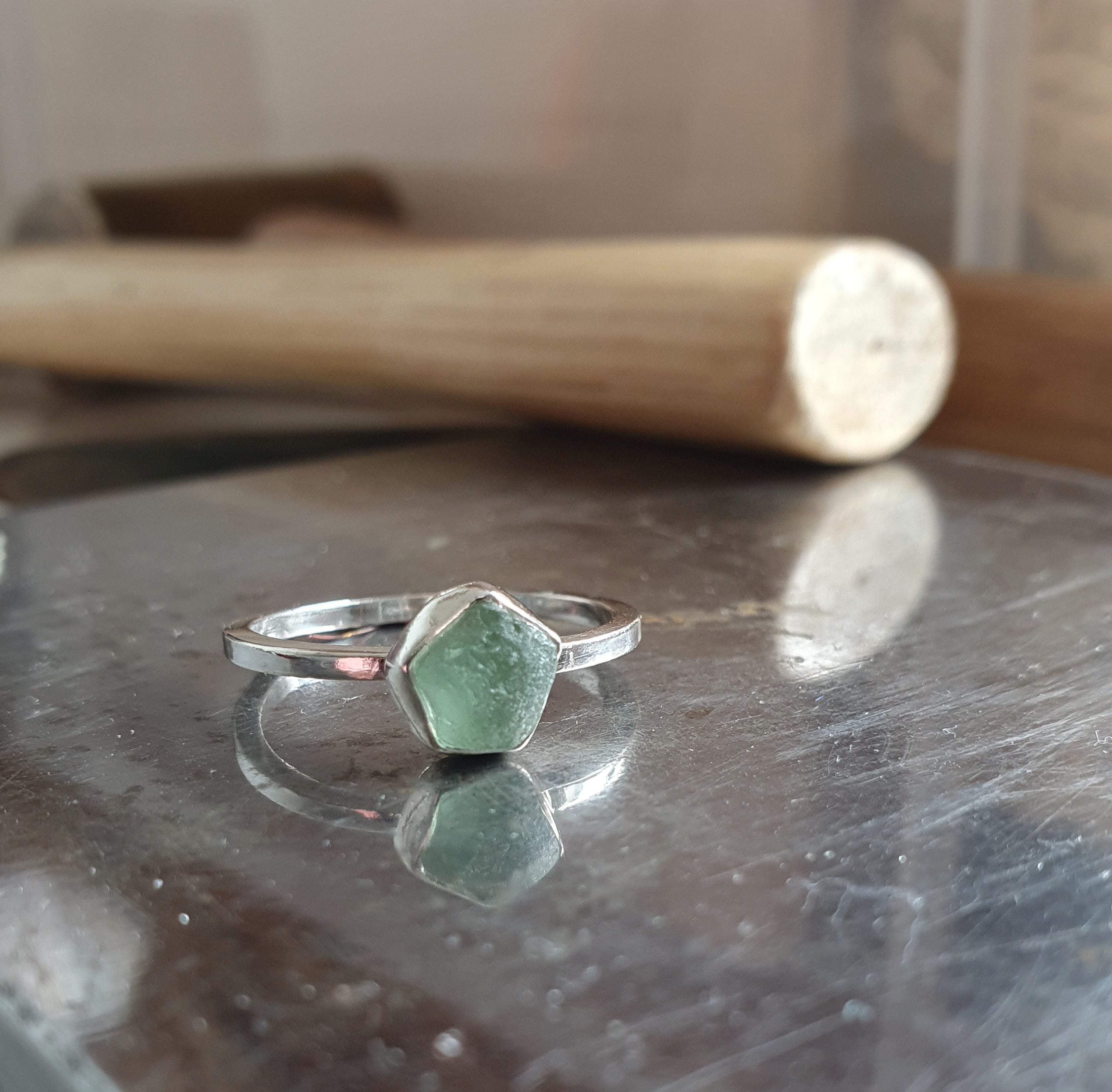 Silver ring with green sea glass focal point